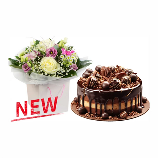 Аранжировка от свежи сезонни цветя и голяма торта от Подари Цвете, доставки в Радомир и Дупница.
